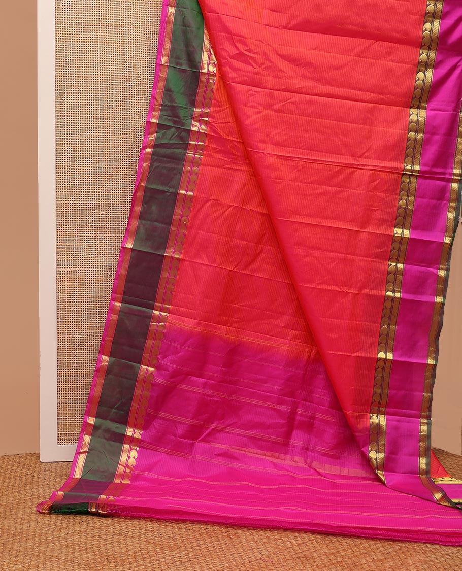 Pink striped Kanchipuram silk saree, contrast ganga jamuna rettai pettu border of manga, banaras, and mayil kann designs, and zari striped pallu