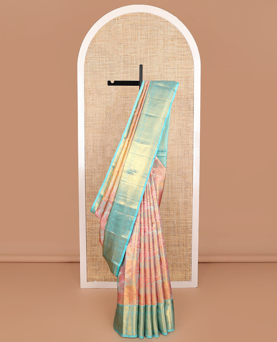 Pink Kanchipuram Tissue Silk Saree, Vibrantly Woven with Jacquard Design on Its Body, Complemented by a Contrast Border of Thilakam Mokku, Laddu Kamalam, and Zari Designs, Gleaming Zari Striped Pallu, and Paired with a Contrast Blouse