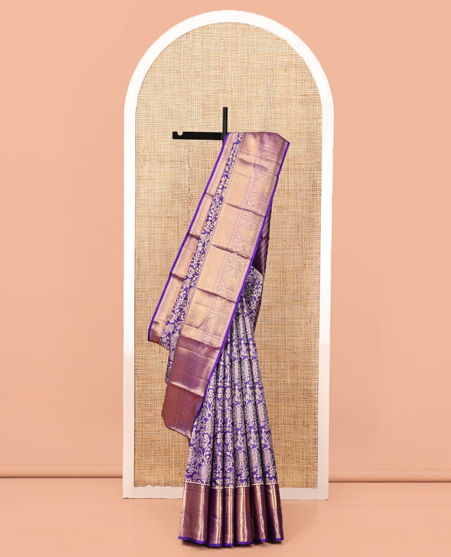 Violet Kanchipuram Tissue Silk Saree, Gracefully Embellished with Floral Jacquard, a Zari Border of Thilakam Mokku, Jaal, and Manga Designs, Diagonal Striped Pallu, and Matching Blouse
