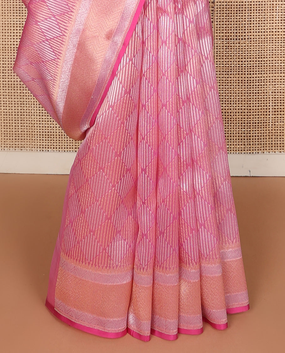 Pink jaal jacquard silk saree, geometric patterned border, and pallu of chevron design
