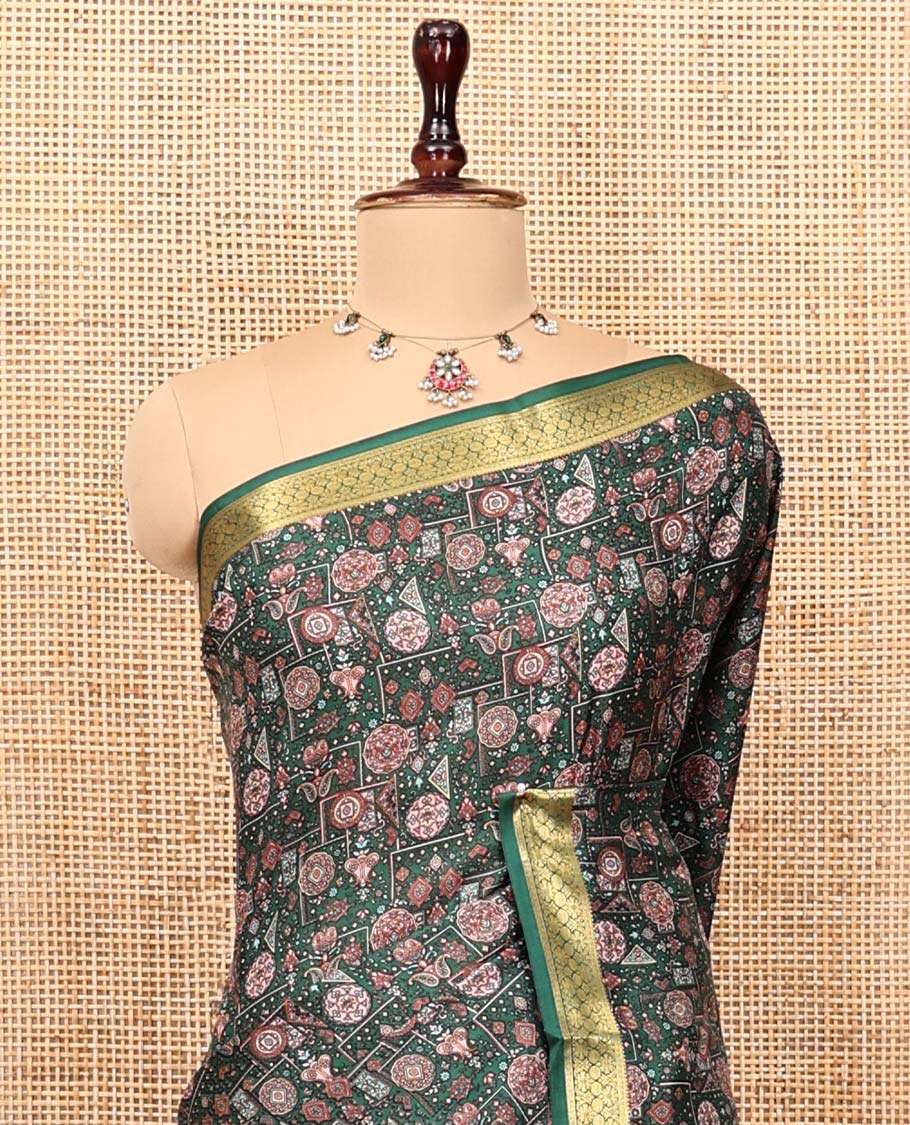 Green Printed Silk Saree, Adorned with Intricate Designs, Highlighted by a Traditional Zari Border, Printed Pallu, and a Matching Blouse