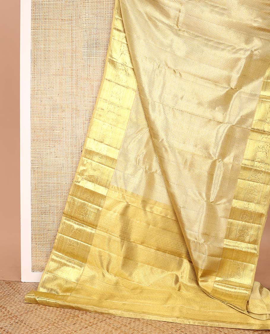 Gold jacquard Kanchipuram tissue silk saree, zari border of thilakam mokku, banaras, muthu, diamond, and kodi visiry designs, and jaal pallu