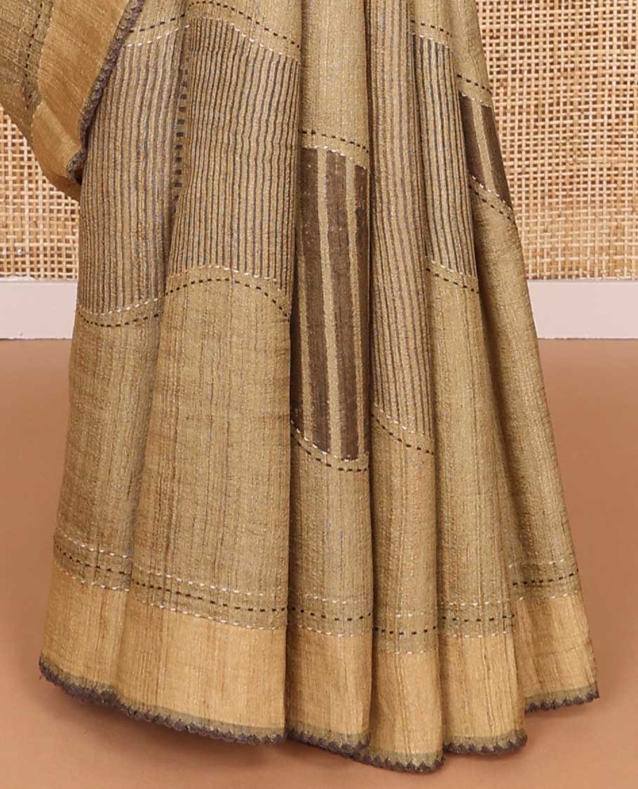 Light brown abstract design tussar silk saree with contrast plain border & striped pallu