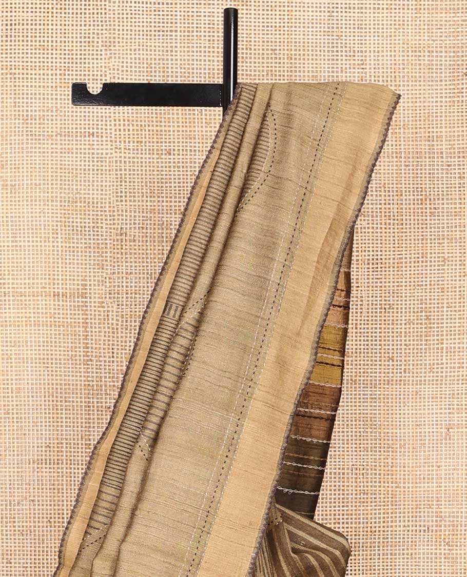 Light brown abstract design tussar silk saree with contrast plain border & striped pallu