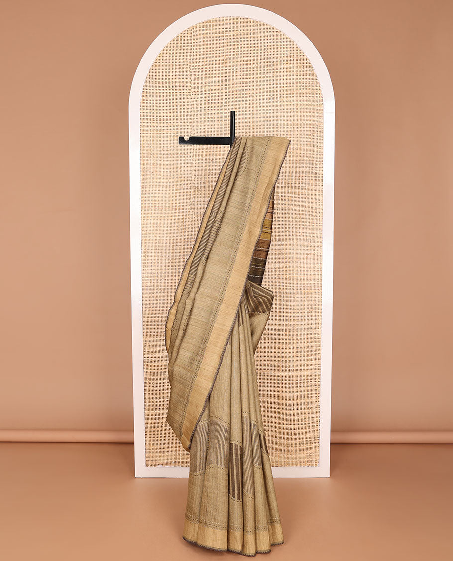 Light brown abstract design tussar silk saree with contrast plain border & striped pallu