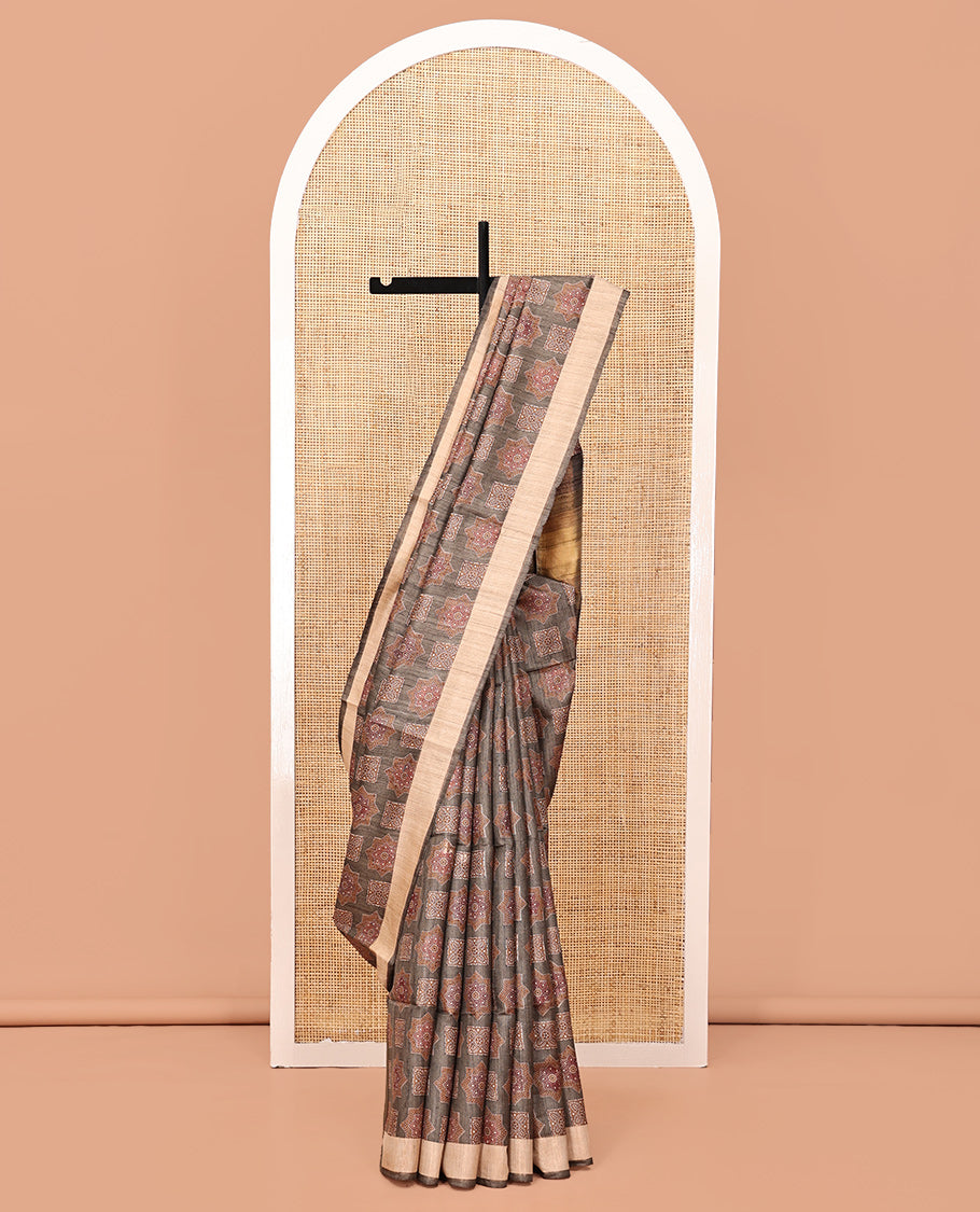 Brown Tussar Silk Saree, Artfully Detailed with Ajrakh-Style Motifs Block Print, a Subtle Border, a Heathered Pallu, and a Matching Blouse