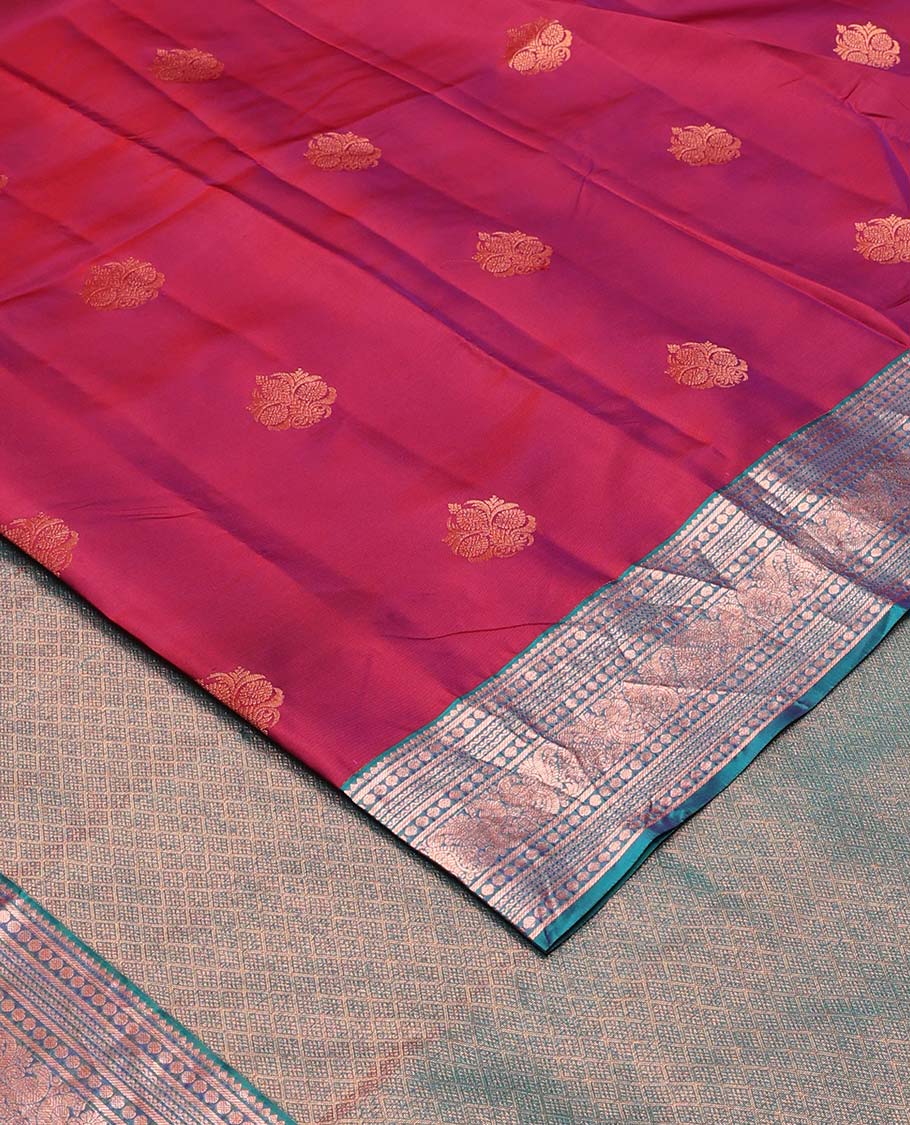 Red zari buttas Vasundhara silk mix saree, contrast border of thilakam mokku, banaras, poun, neli, and mayil design, and zari-rich jaal pallu