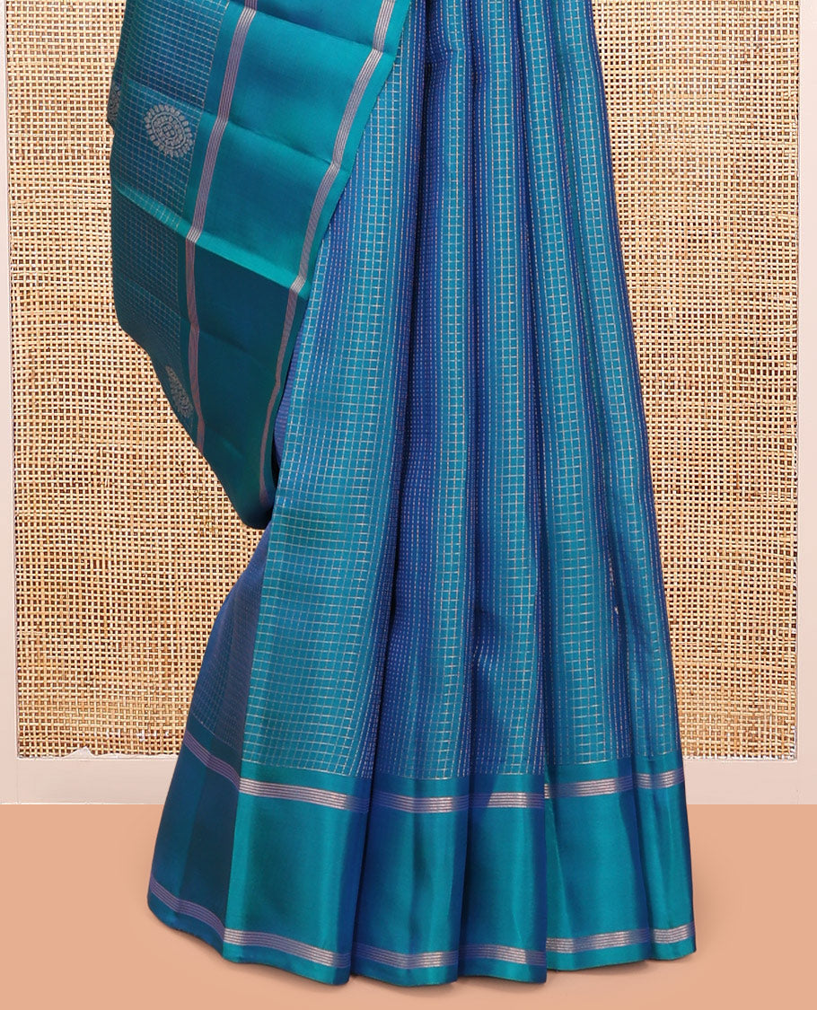 Blue Vasundhara Lite Silk Mix Saree, Adorned with Mayil Buttas and Checks, a Bodi Border, Grand Jaal Pallu, and a Matching Blouse