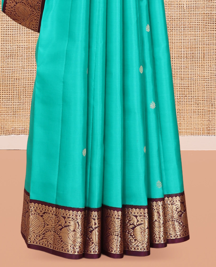 Blue Vasundhara Silk Saree, Adorned with Zari Buttas, a Contrast Korvai Border of Thilakam, Banaras, and Mayil Designs, Richly Woven Pallu, and a Contrast Blouse
