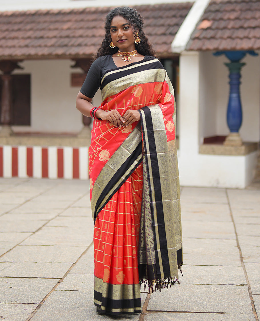 Reddish Orange Budget Silk Saree, Adorned with Jhumka Butta Enclosed Checks, Contrast Traditional Zari Rettai Pettu Border, Grand Pallu, and a Contrast Blouse