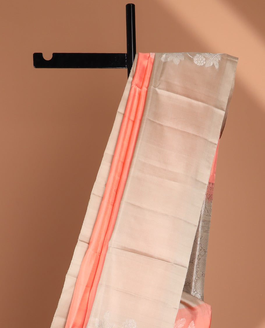Peach floral buttas soft silk saree with contrast floral border & round buttas pallu
