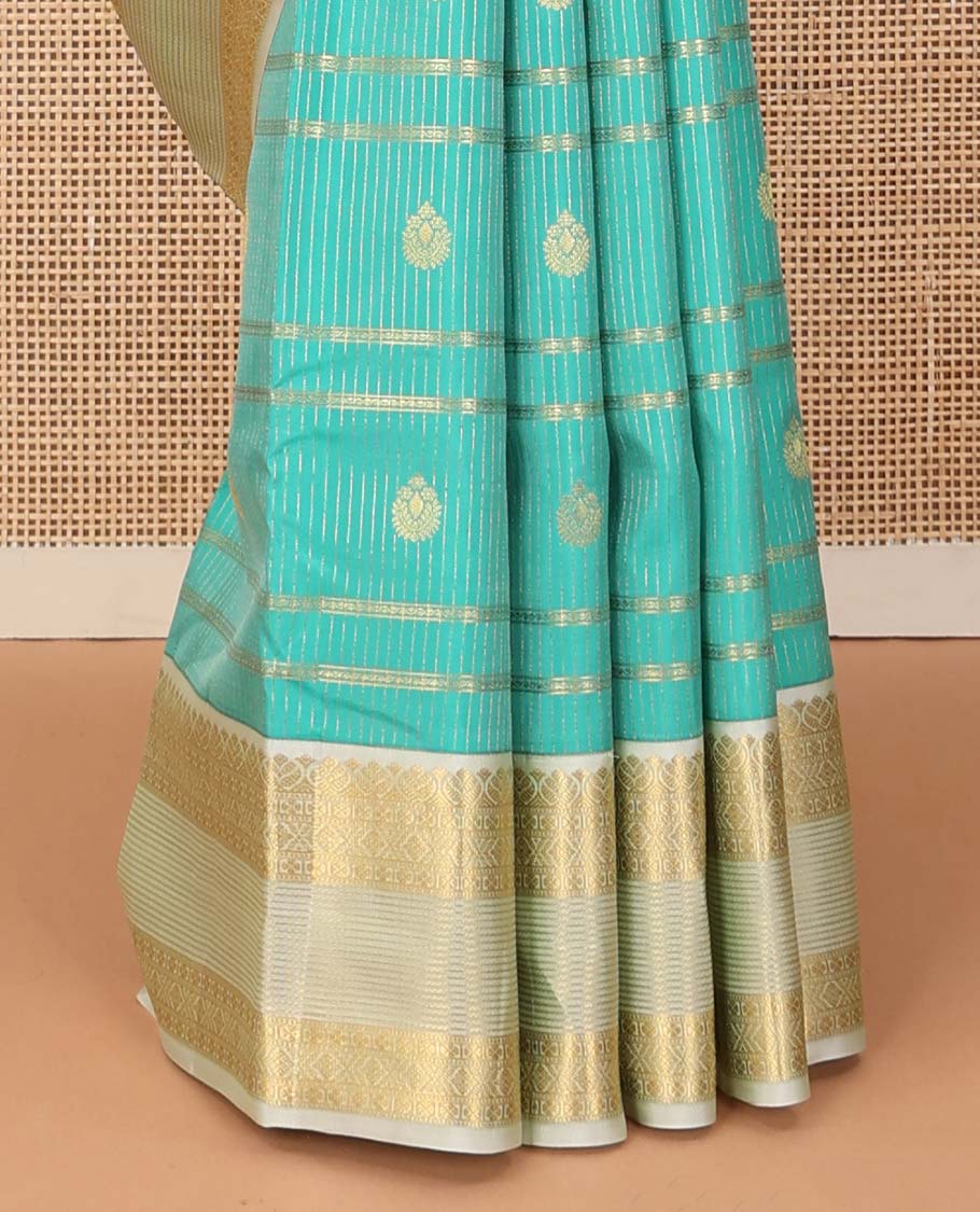 Turquoise blue zari design silk saree, contrast traditional motifs steeped zari border, and zari-rich jaal pallu