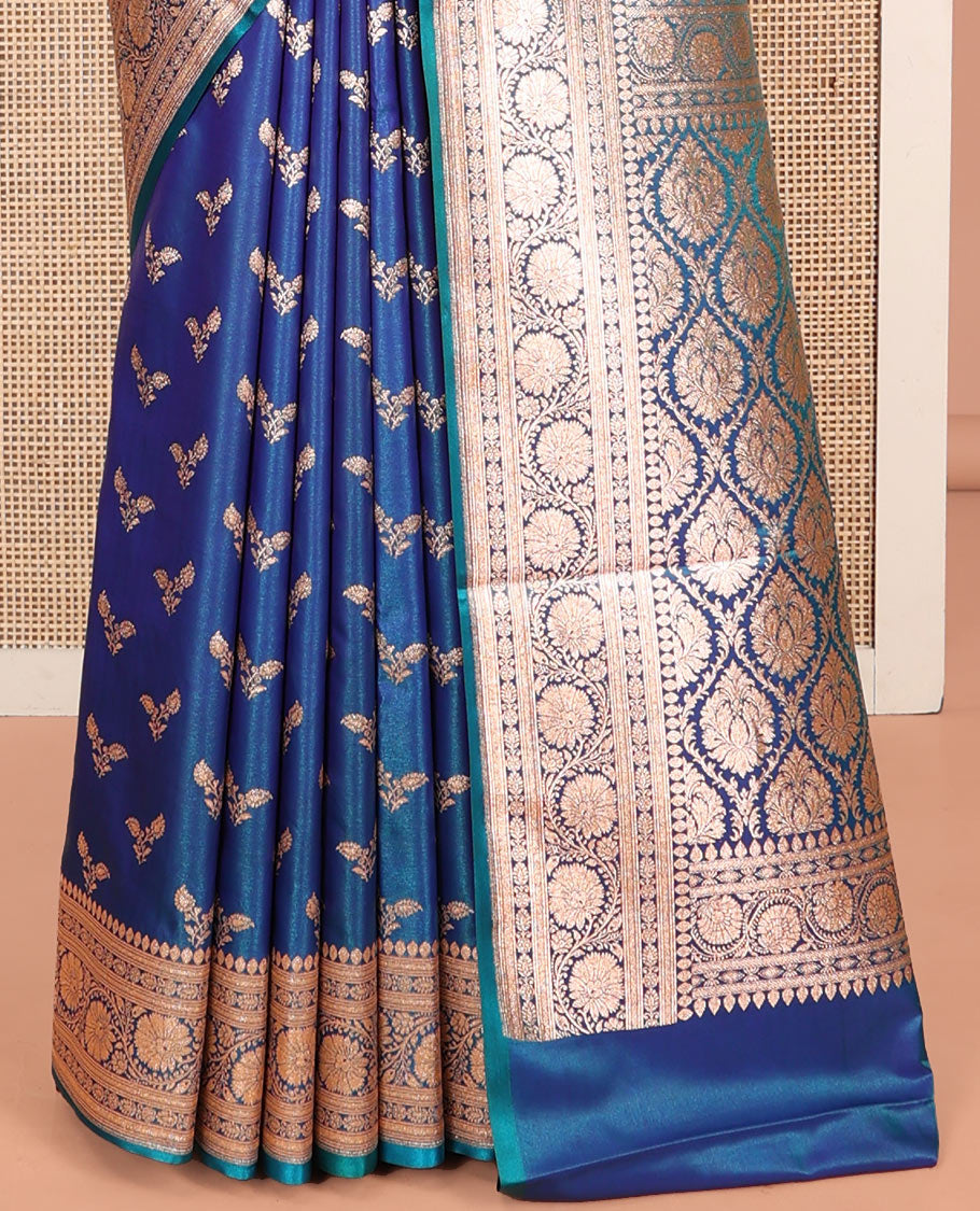 Blue Banarasi Nylon Saree, Bedecked with Floral Buttas, Highlighted by a Traditional Zari Border, Intricate Pallu, and a Matching Blouse