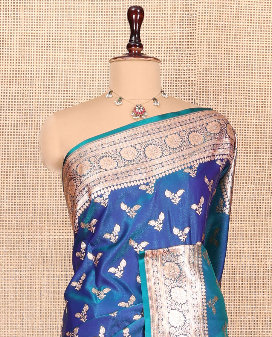 Blue Banarasi Nylon Saree, Bedecked with Floral Buttas, Highlighted by a Traditional Zari Border, Intricate Pallu, and a Matching Blouse