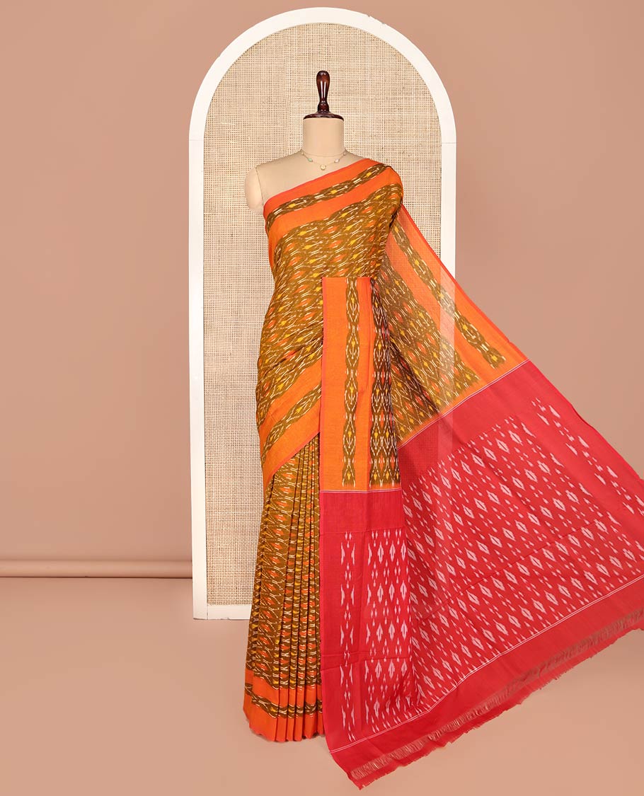 Brown Ikkat Cotton Saree, Ornamented with Ikkat-Style Ogee Patterns on Its Body, Complemented by a Contrast Ikkat Border, Pallu of Ikkat-Style Buttas, and Has No Blouse