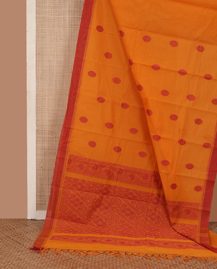 Orange polka dots buttas kanchi cotton saree, contrast border, and pallu of jaal designs