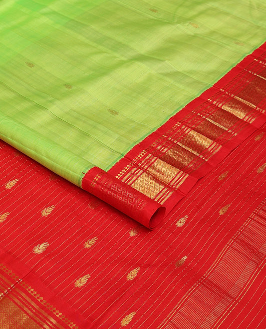 Green zari buttas Kanchipuram silk saree, contrast one-sided korvai border of panner sombu,banaras,muthu & mayil kann &  zari design pallu