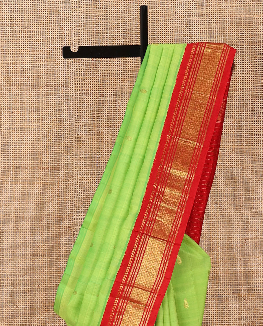 Green zari buttas Kanchipuram silk saree, contrast one-sided korvai border of panner sombu,banaras,muthu & mayil kann & zari design pallu