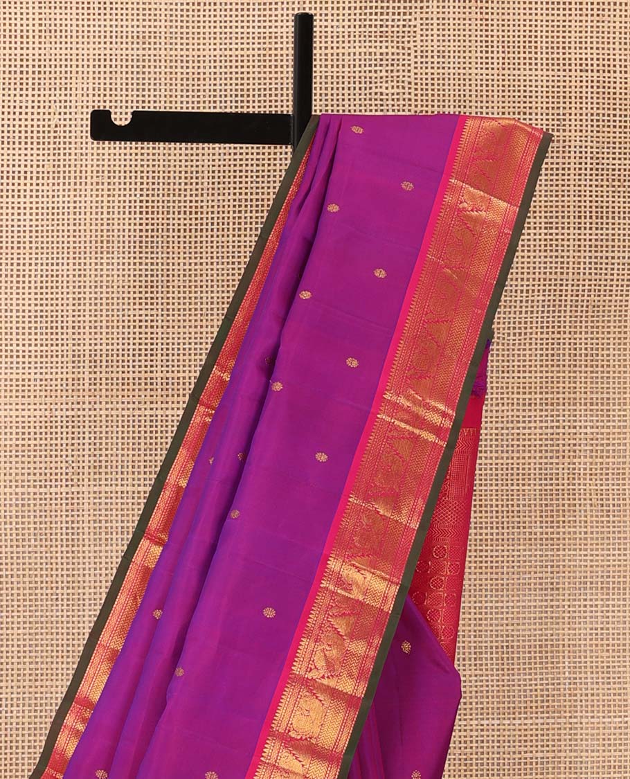 Purple Kanchipuram Silk Saree, Beautified with Kamalam Zari Buttas on Its Body, Complemented by Contrast Border of Rekku, Muthu, Mayil Kann, Mayil, and Vanki Designs, Pallu of Butta Enclosed Checks, and Paired with a Contrast Blouse