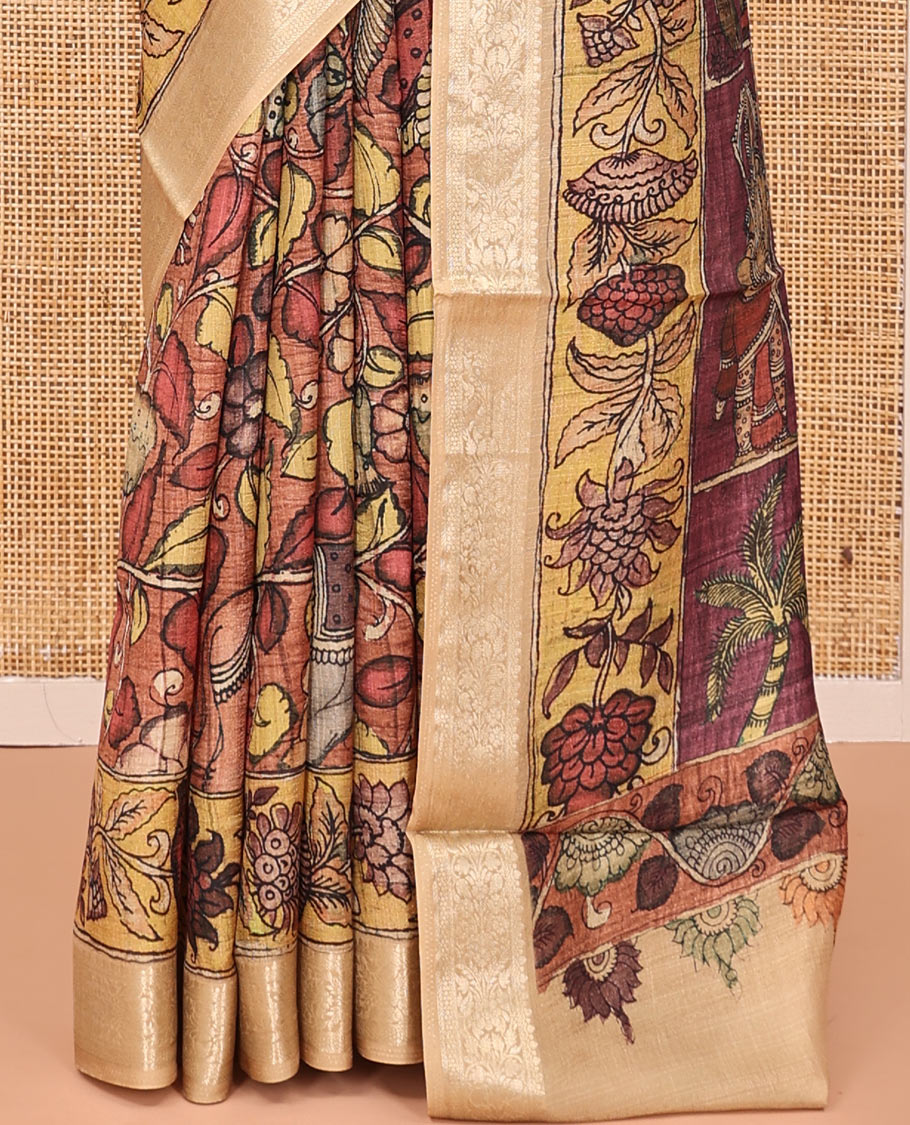 Brown Kalamkari Saree, Embellished with Floral Print, Complemented by Contrast Zari Border, Pallu of Human Figurines Print, and a Contrast Blouse