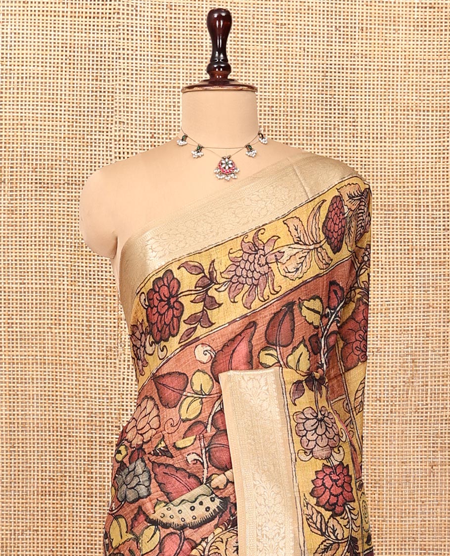Brown Kalamkari Saree, Embellished with Floral Print, Complemented by Contrast Zari Border, Pallu of Human Figurines Print, and a Contrast Blouse