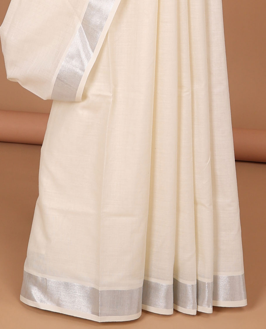 Cream peacock feather embroidered motifs kerala saree,zari border & floral creeper & peacock feather embroidered pallu