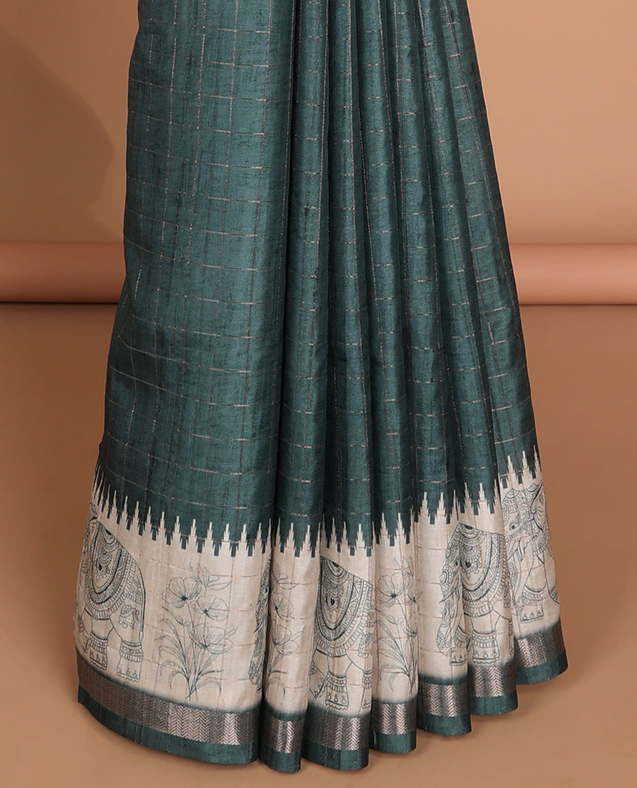 Peacock green all-over copper zari checks design semi tussar saree with floral, elepgant design, copper zari jacqaurd border & linnnin chip pallu along with self ajrackprinted checks blouse