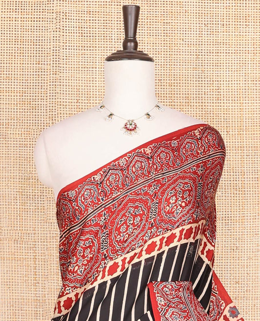 Black striped modal saree with contrast floral design & ajrak floral design pallu