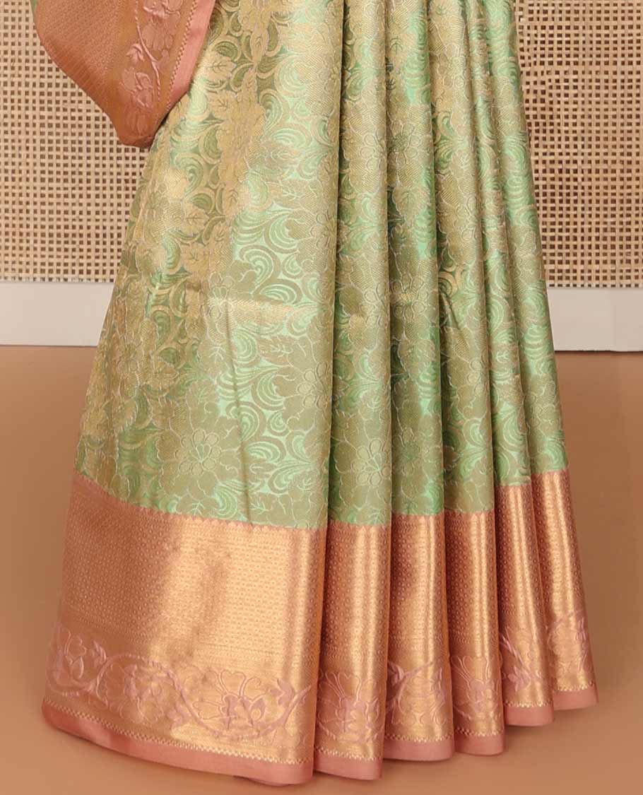 Light green floral jacquard soft silk saree with contrast zari design border & argyle design pallu