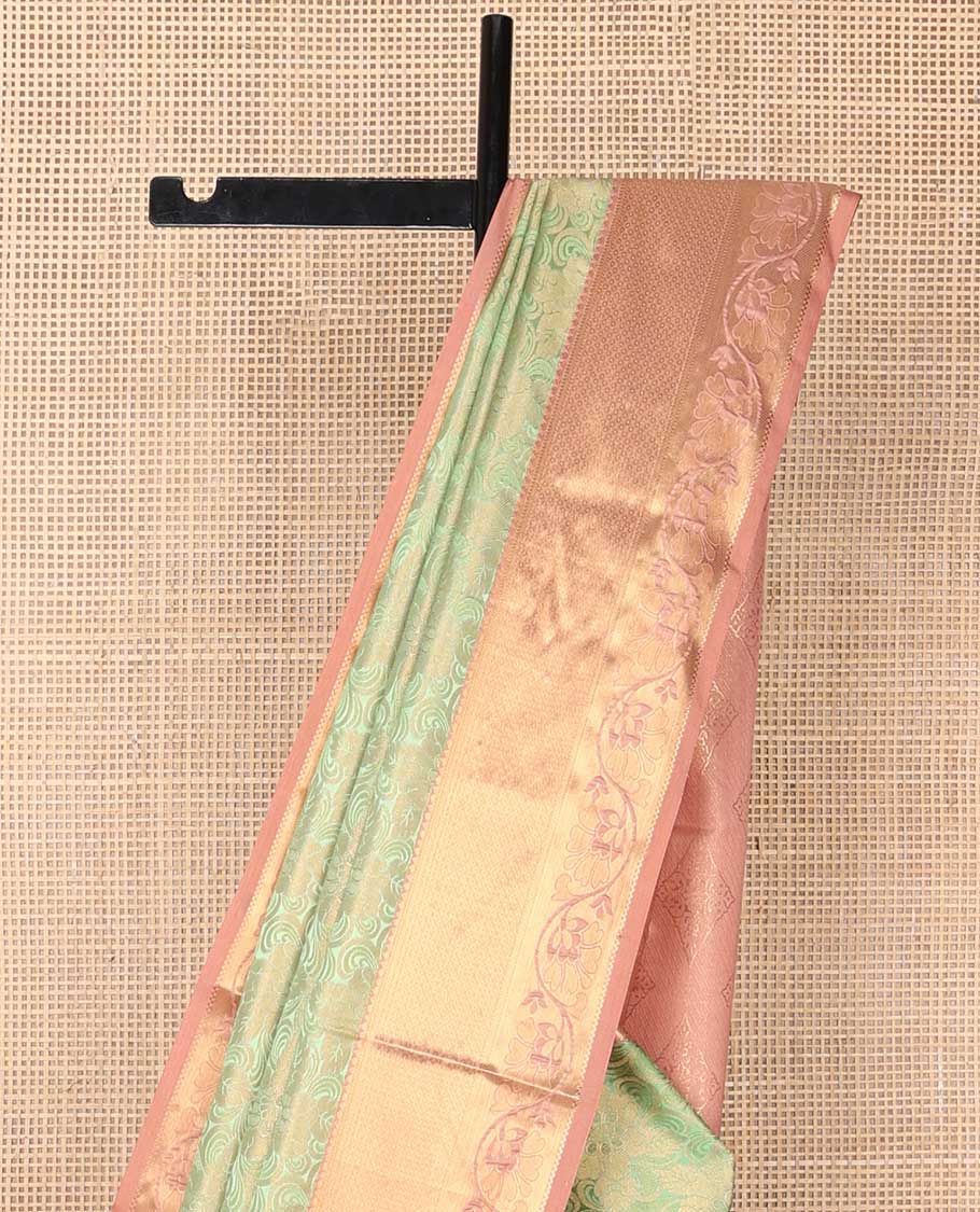 Light green floral jacquard soft silk saree with contrast zari design border & argyle design pallu