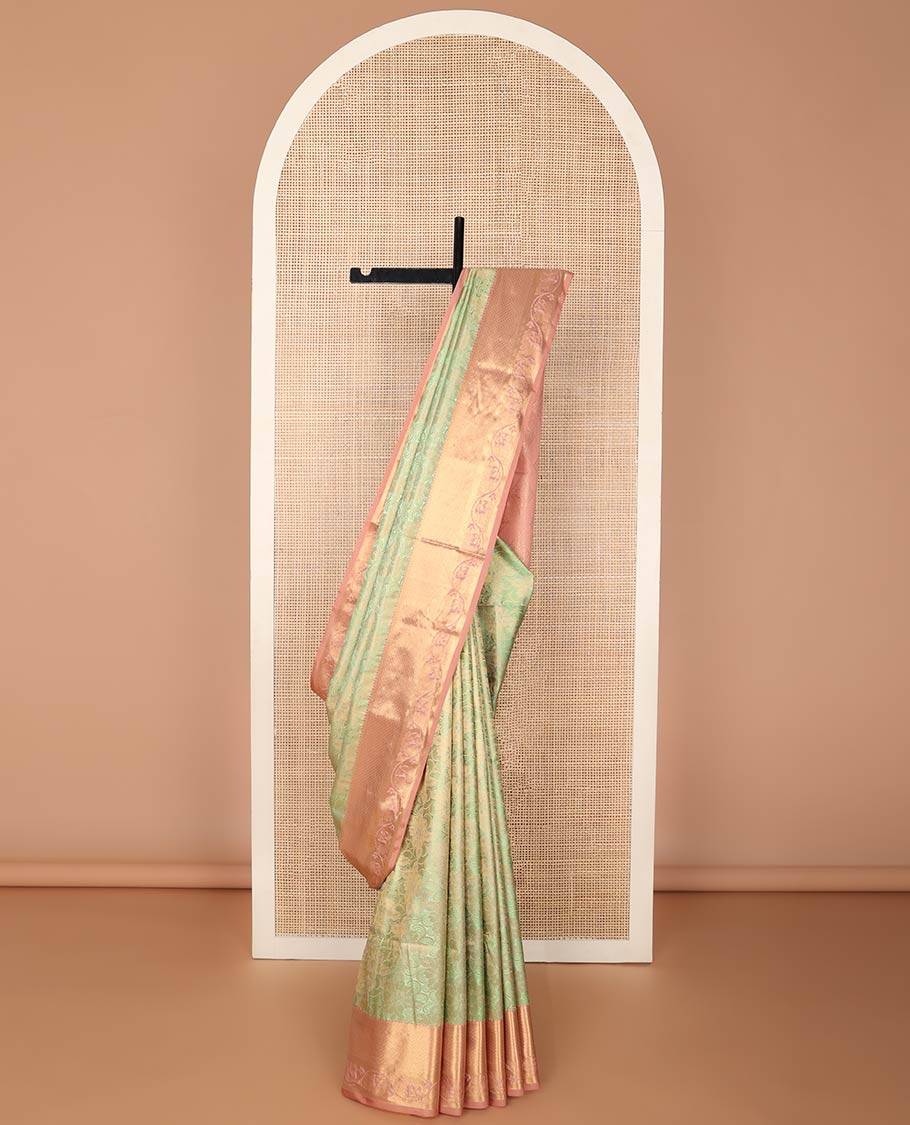 Light green floral jacquard soft silk saree with contrast zari design border & argyle design pallu