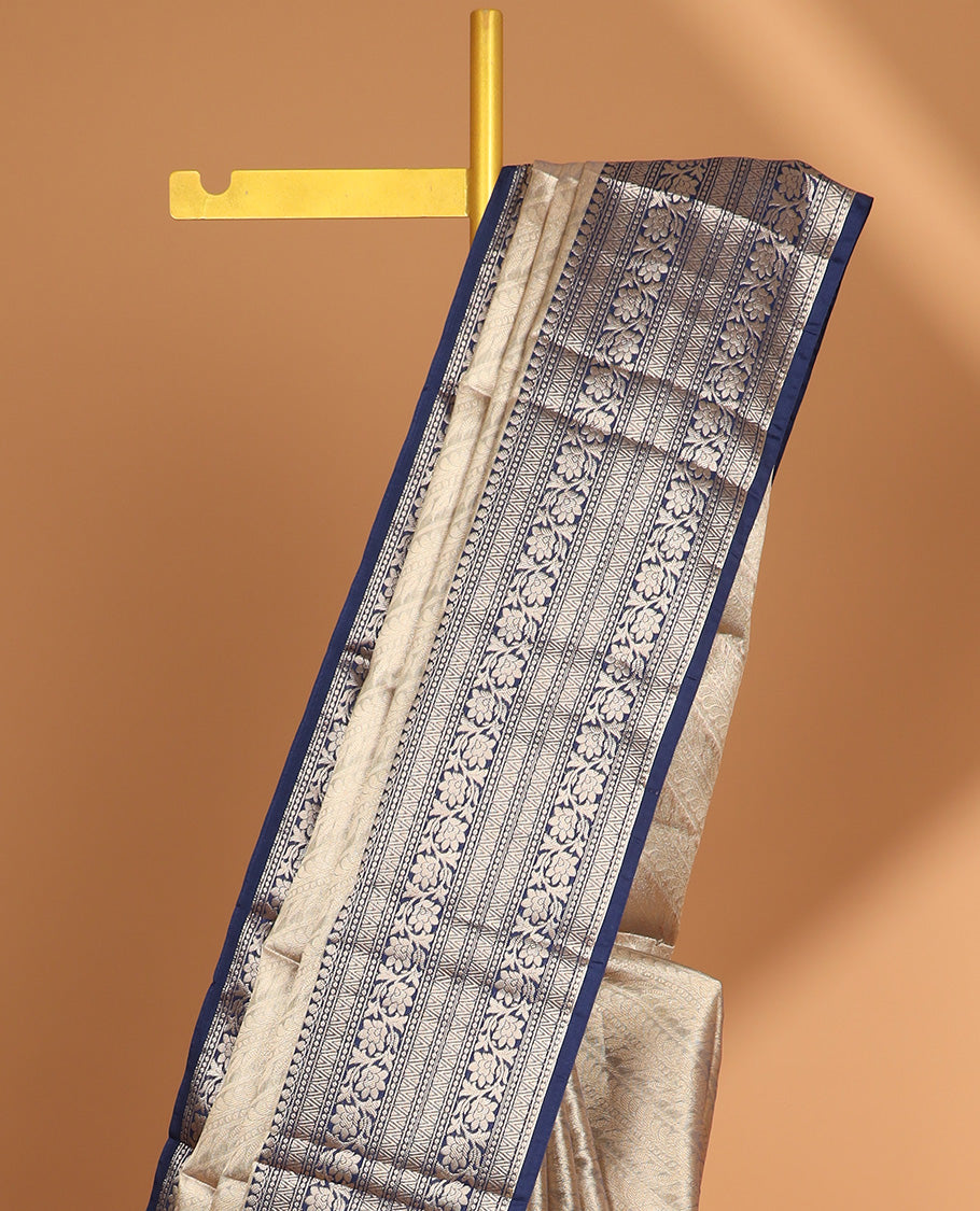 Grey striped floral semi tissue saree with contrast floral design border & zari design pallu