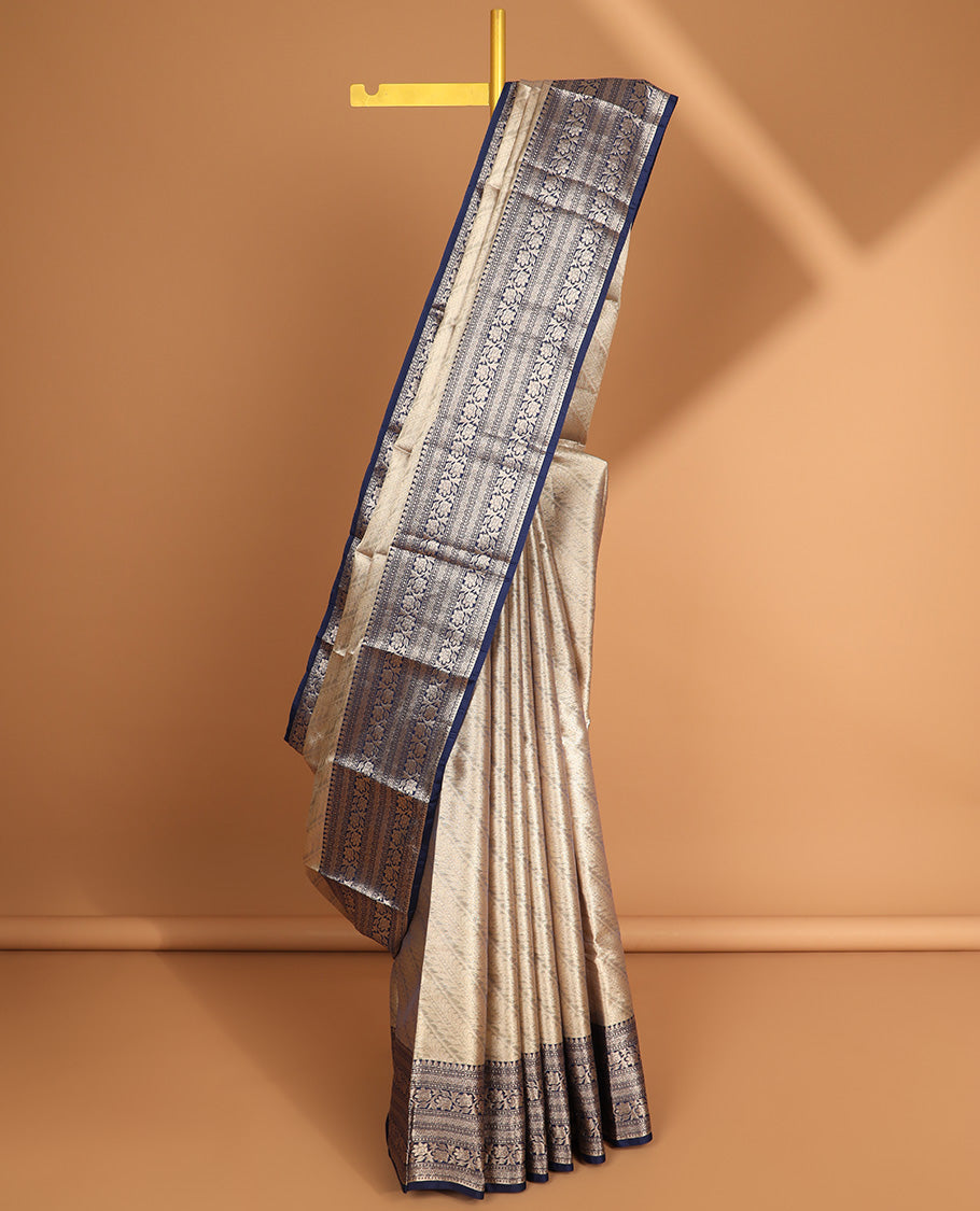 Grey striped floral semi tissue saree with contrast floral design border & zari design pallu