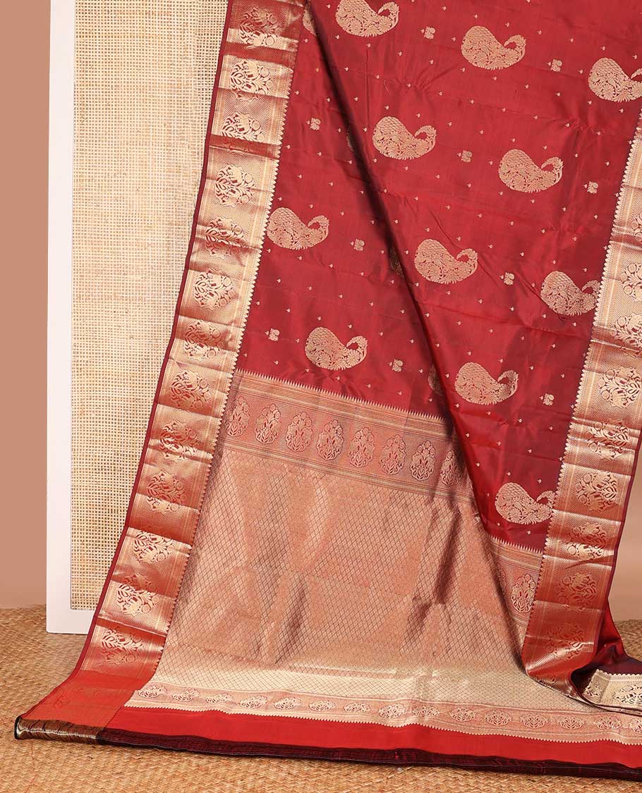 Maroon zari buttas silk saree, zari border of thilakam mokku, muthu, kathir, ara maadam, and yaanai, and jaal pallu
