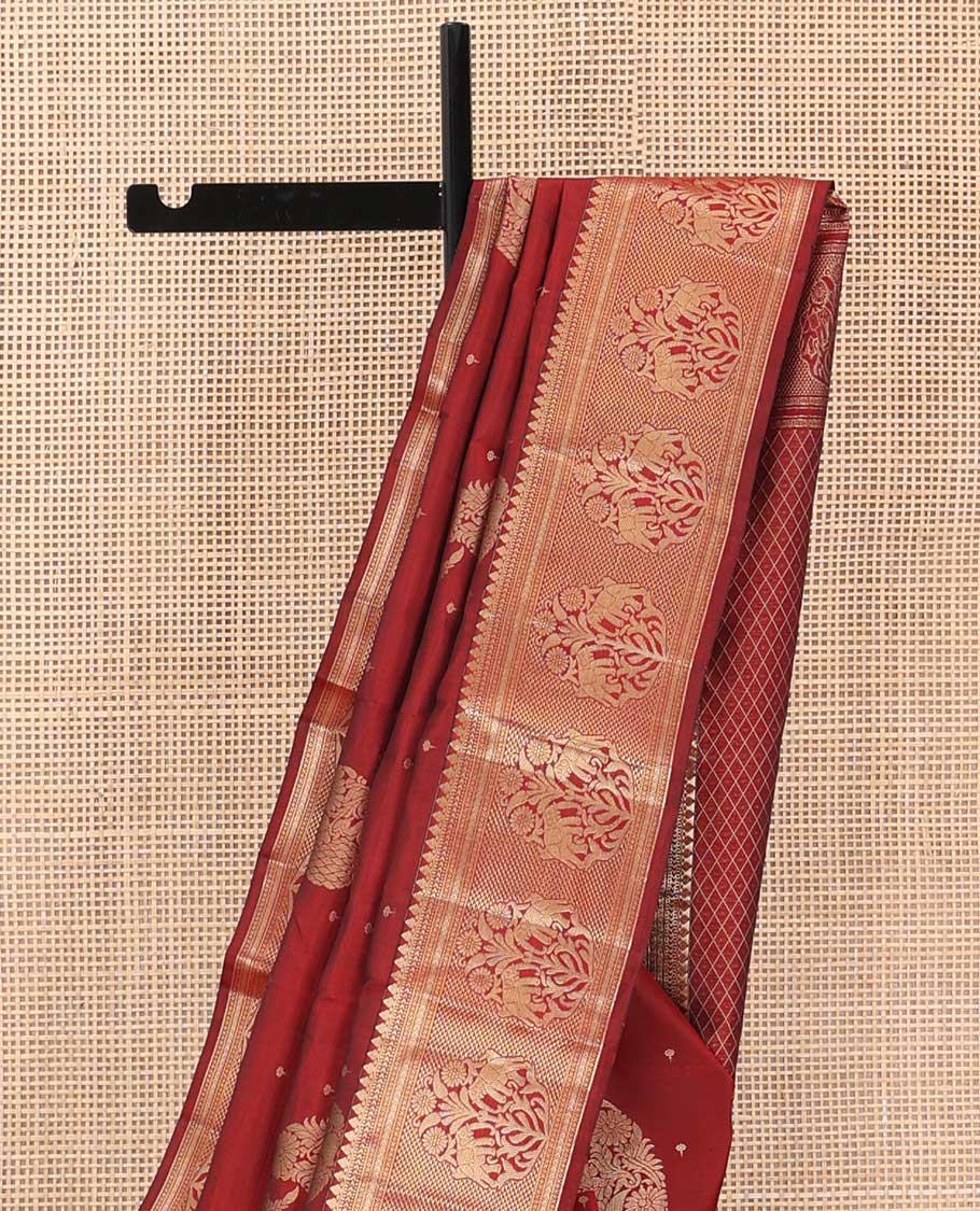 Maroon zari buttas silk saree, zari border of thilakam mokku, muthu, kathir, ara maadam, and yaanai, and jaal pallu