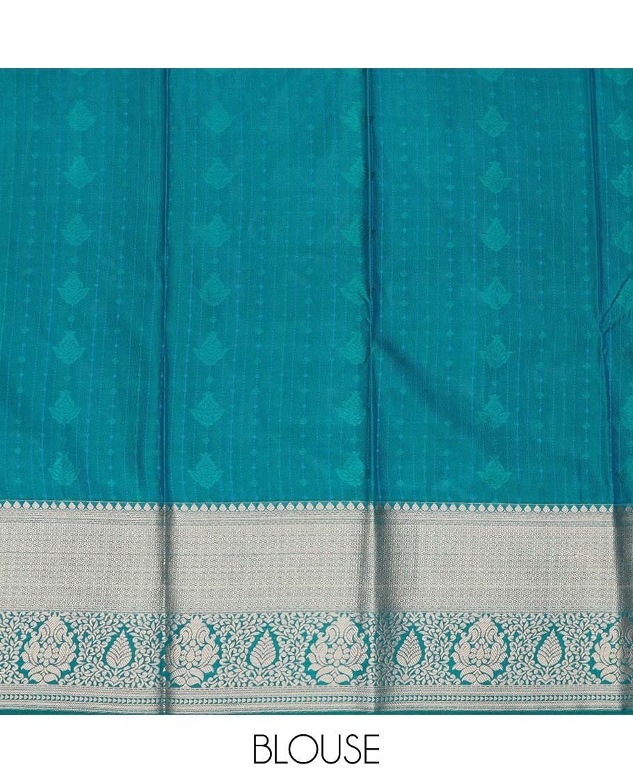 Blue art silk pavadai material, zari buttas with contrast traditional zari bordered skirt, and a contrast bordered blouse