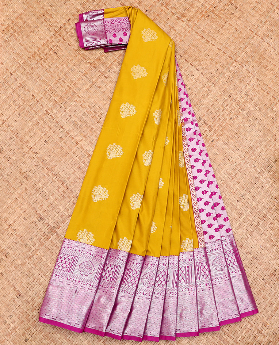 Mustard Budget Silk Saree, Graced with Buttas All Over Its Body, Complemented by a Contrast Traditional Zari Design Rettai Pettu Border, Pallu Steeped with Floral Designs, and Paired with a Contrast Blouse