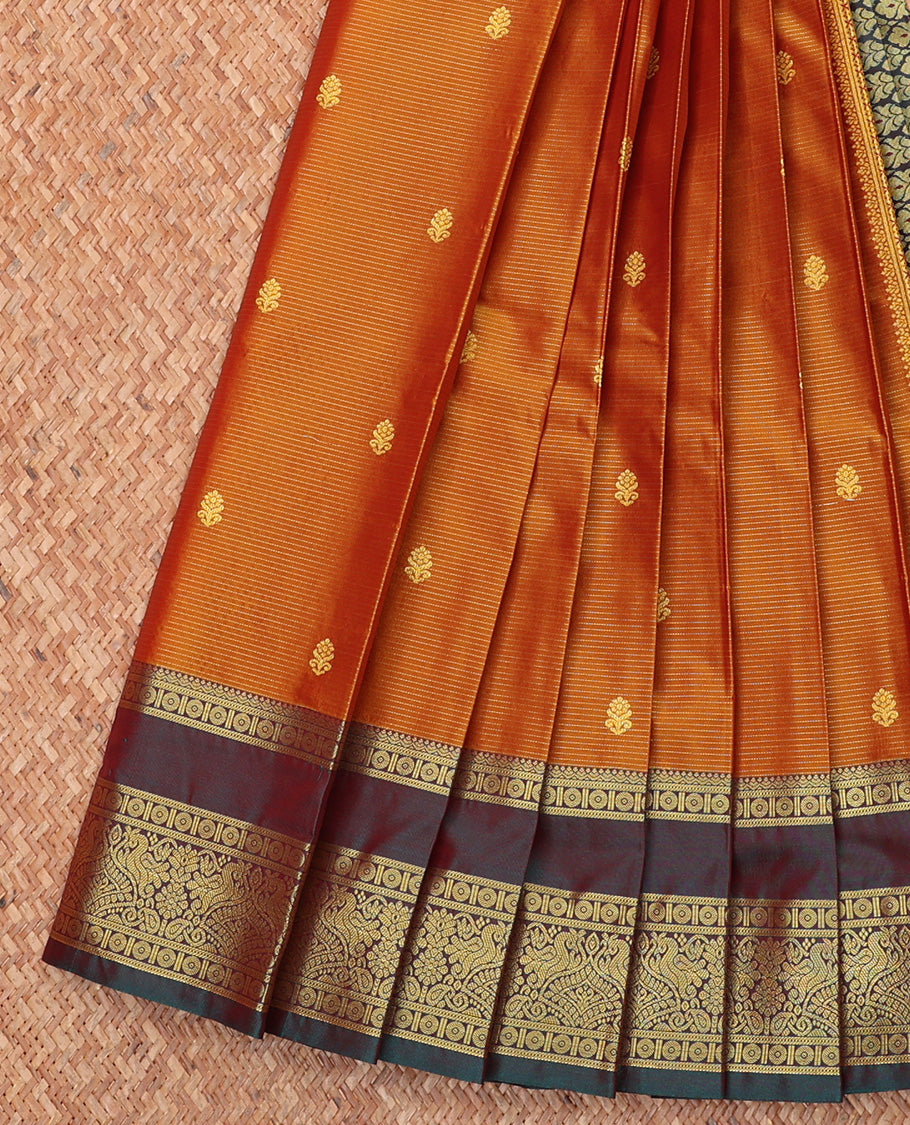 Orange Budget Silk Saree, Subtly Woven with Buttas All Over Its Body, Complemented by Contrast Traditional Zari Rettai Pettu Border, Grand Pallu, and Paired with a Contrast Blouse
