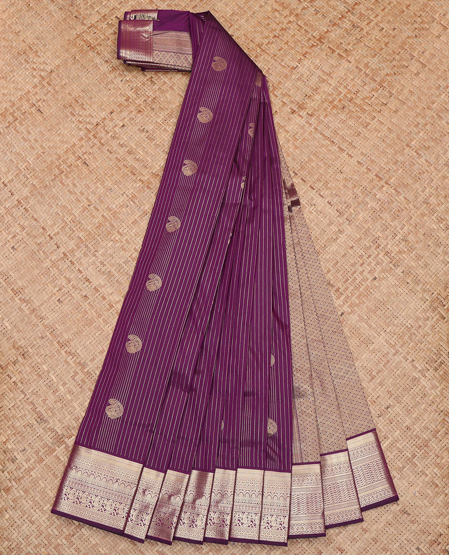 Purple Budget Silk Saree, Bedecked with Paisley Buttas and Zari Stripes All Over Its Body, Highlighted by a Traditional Zari Design Border, Pallu of Jaal Design, and Paired with a Matching Blouse