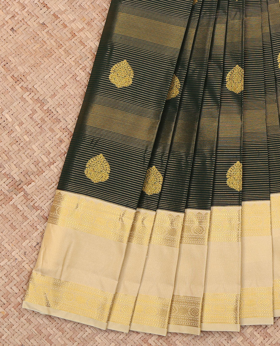 Green Budget Silk Saree, Detailed with Zari Buttas and Zari Stripes All Over Its Body, Complemented by a Contrast Traditional Zari Design Rettai Pettu Border, Delicately Woven Jaal Pallu, and Paired with a Contrast Blouse