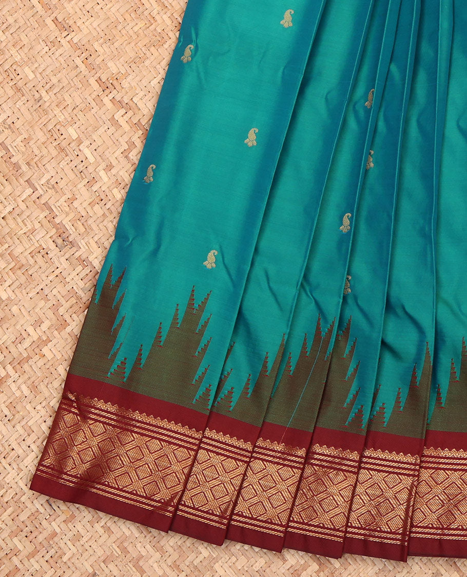 Green Budget Silk Saree, Spotlighted with Zari Buttas, a Contrast Traditional Temple Border, Intricate Pallu, and a Contrast Blouse