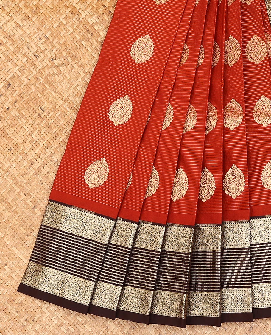 Red zari buttas, and striped gift saree, contrast traditional zari design border, and zari-rich jaal pallu