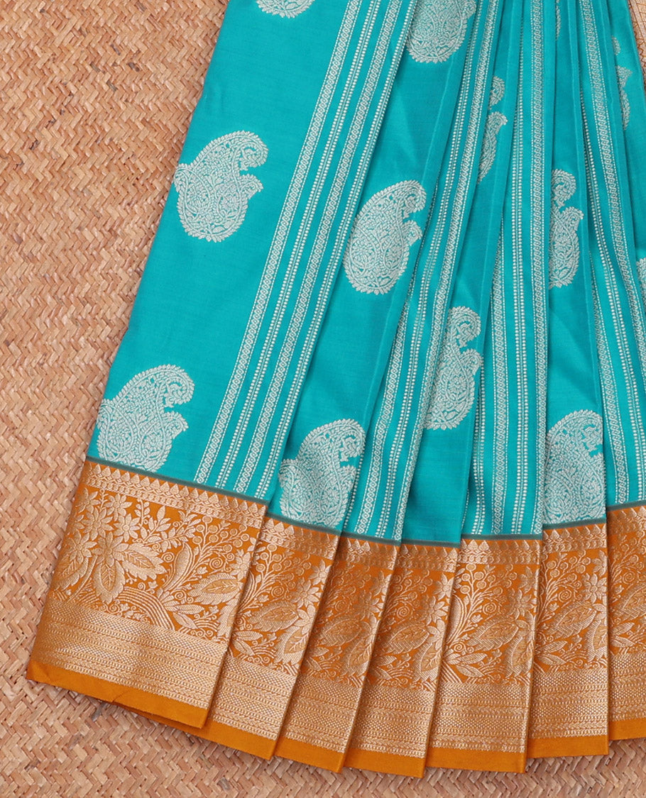 Blue Budget Silk Saree Elevated with Paisley Buttas and Stripes All Over Its Body, Complemented by a Contrast Traditional Border of Floral Designs, Gracefully Embellished Pallu of Paisleys, and Paired with a Contrast Blouse