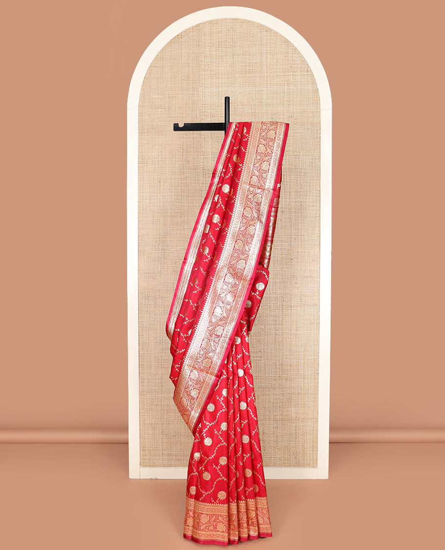Red floral jaal jacquard banarasi silk saree, floral creeper design border, and intricate ogee patterned pallu