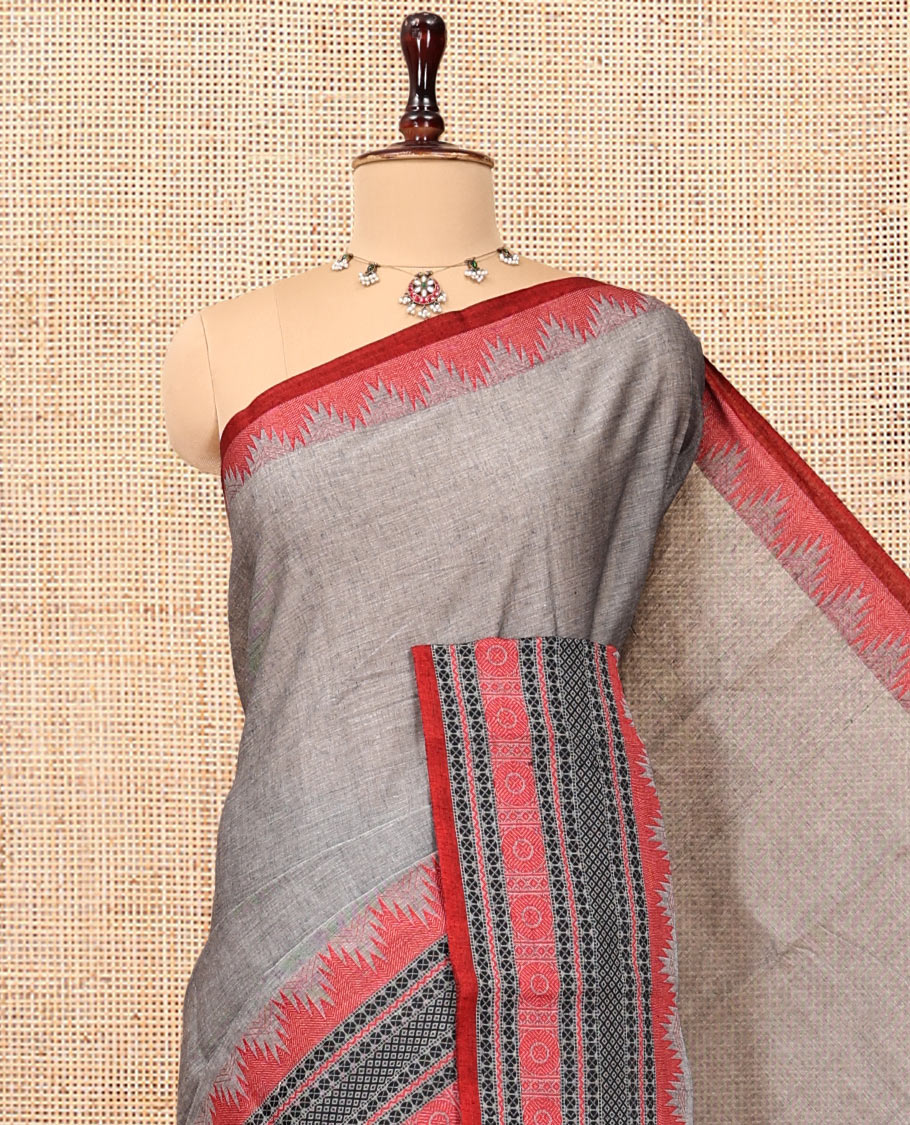 Grey Plain Chettinad Cotton Saree, Complemented by Contrast Temple Traditional Motifs Thread-Woven Border, Striped Pallu, and a Matching Blouse