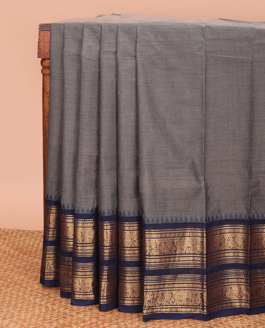 Elephant grey plain Chettinad cotton saree, contrast traditional zari design temple border, and striped pallu