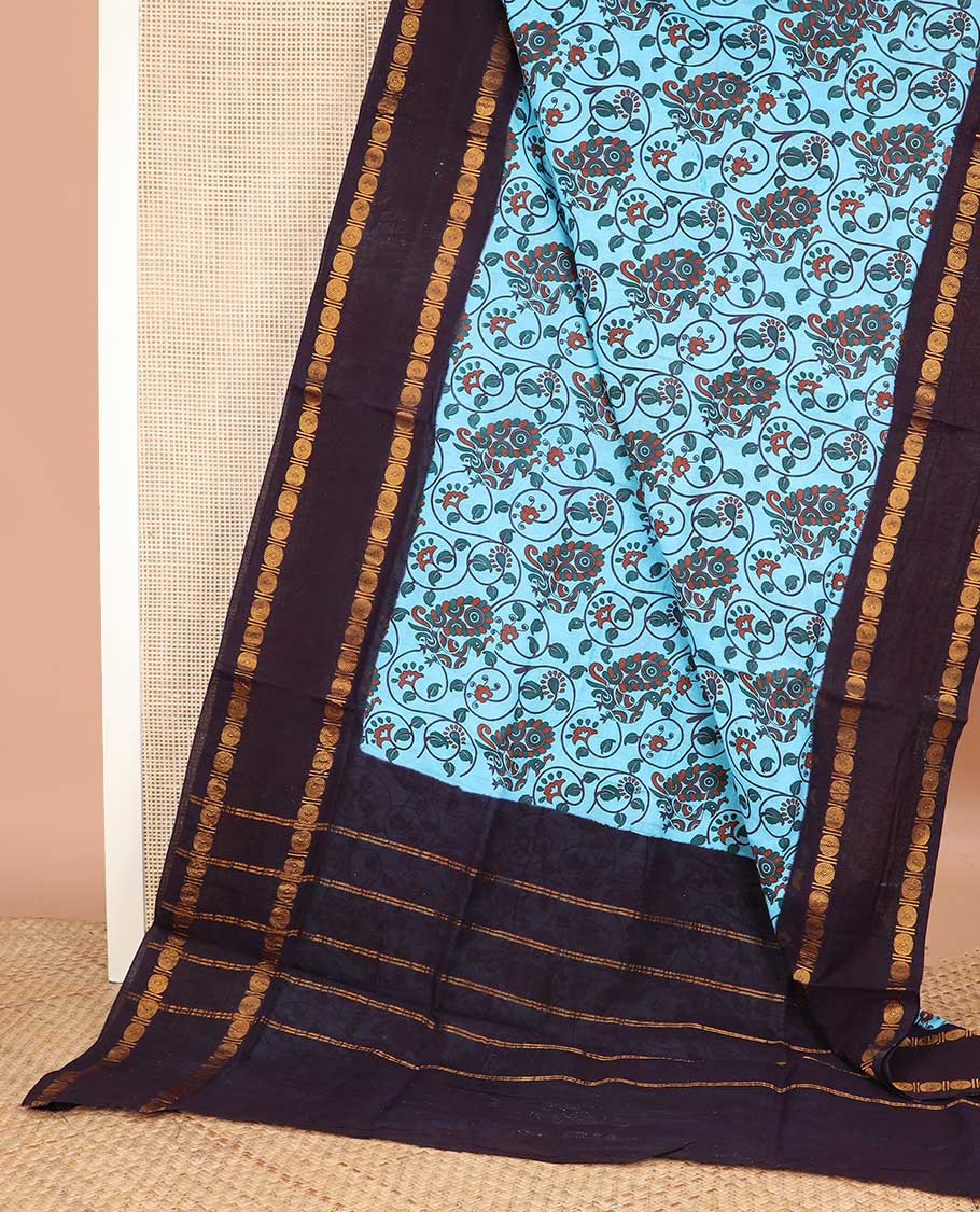 Blue kalamkari style floral vine and bird printed sungudi cotton saree, contrast rettai pettu rudraksham border, and zari striped pallu