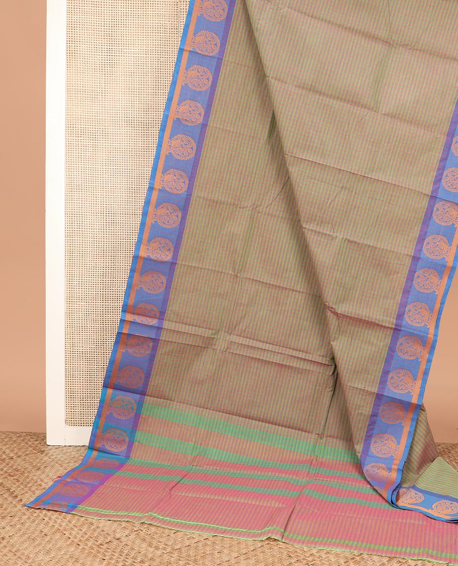 Green checked Chettinad cotton saree, contrast round buttas border, and zari striped pallu