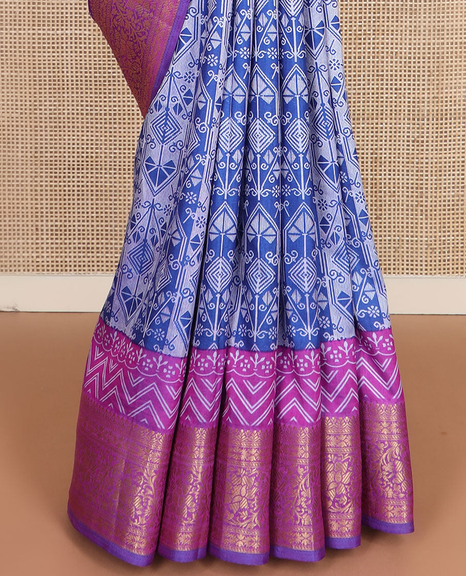 Blue intricately designed semi-banaras patola silk saree, contrast floral creeper zari design border, and pallu of chevron and floral designs