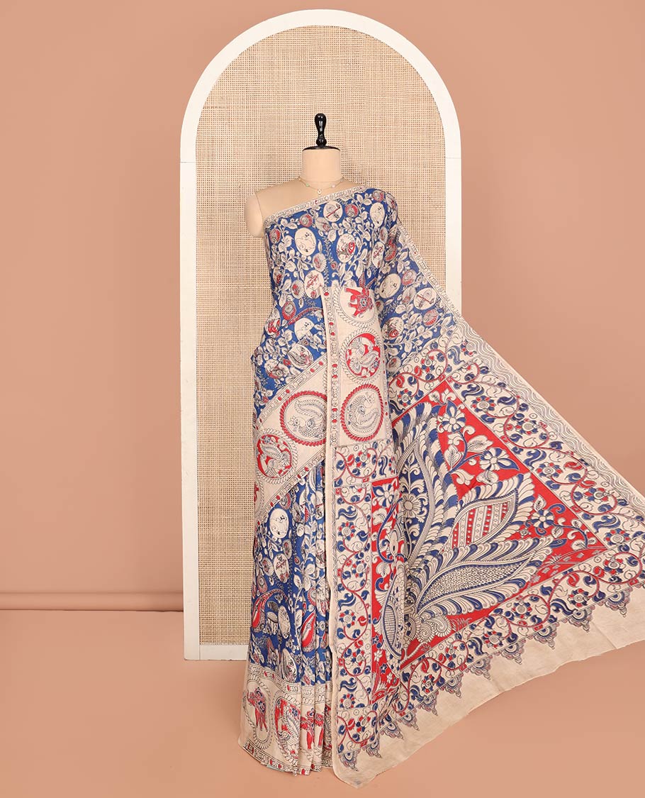 Blue Machine-Printed Kalamkari Cotton Saree, Detailed with Flora-Fauna Motifs, a Round Motifs Printed Border, Peacock Printed Pallu, and a Contrast Blouse